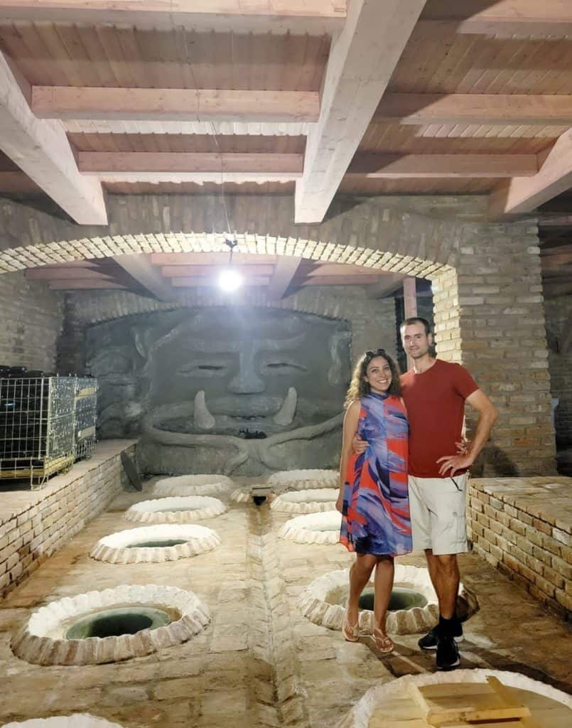 Chris Heckmann and Nimarta Bawa in a winecellar in Georgia