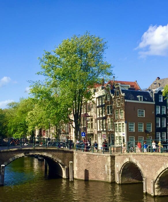 Amsterdam canals and bridges on a sunny day
