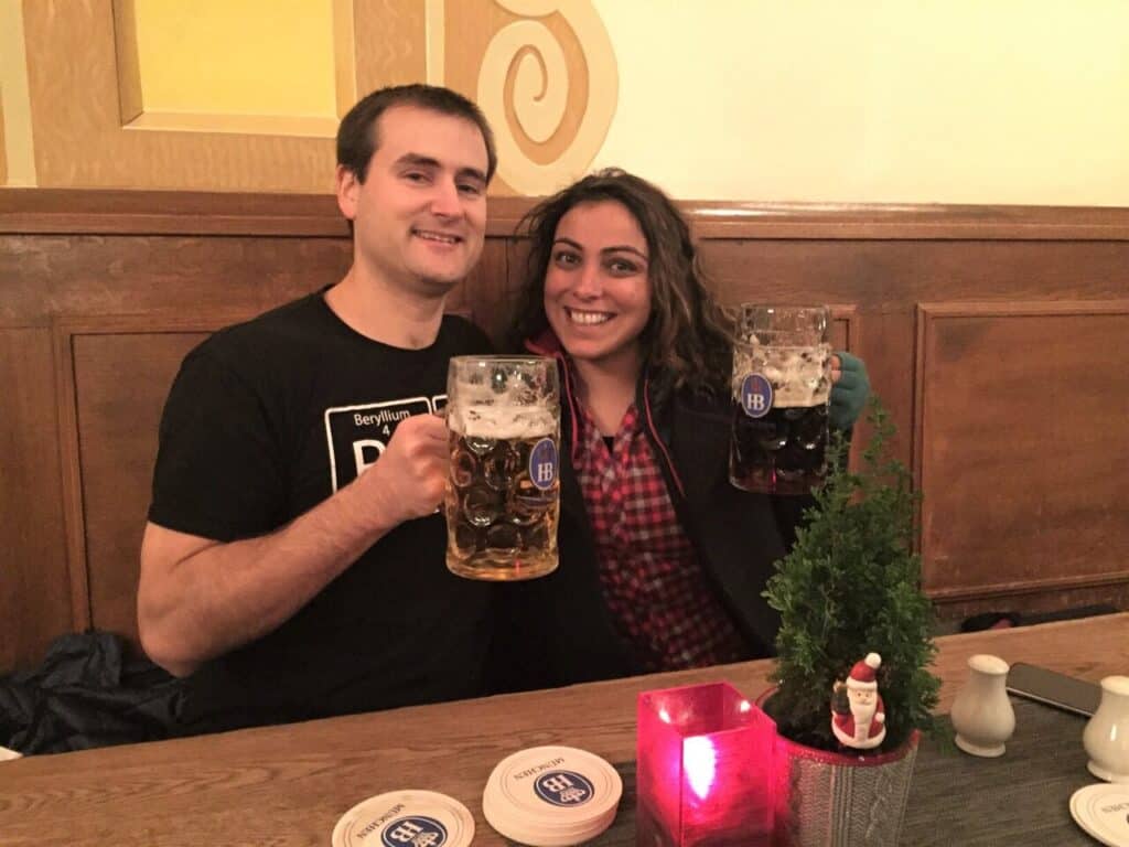 Chris Heckmann and Nimarta Bawa drinking beer Hofbrauhaus in Munich