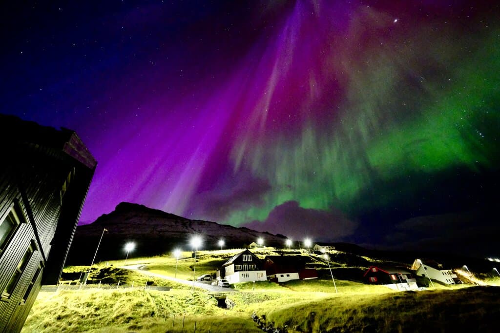 purple northern lights in the Faroe Islands