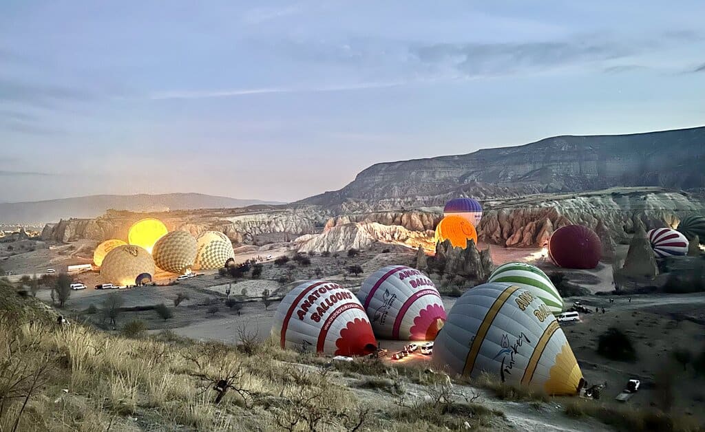 Ballons filling with air in Red Valley Cappadocia