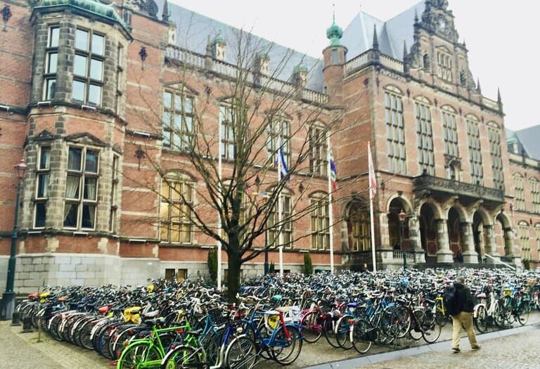 bikes parked in front of the University of Groningen