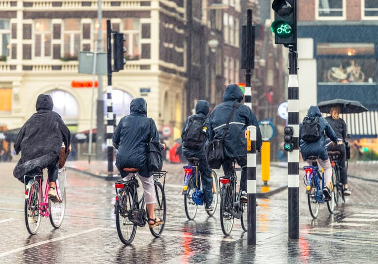 people cycling in the rain in the Netherlands
