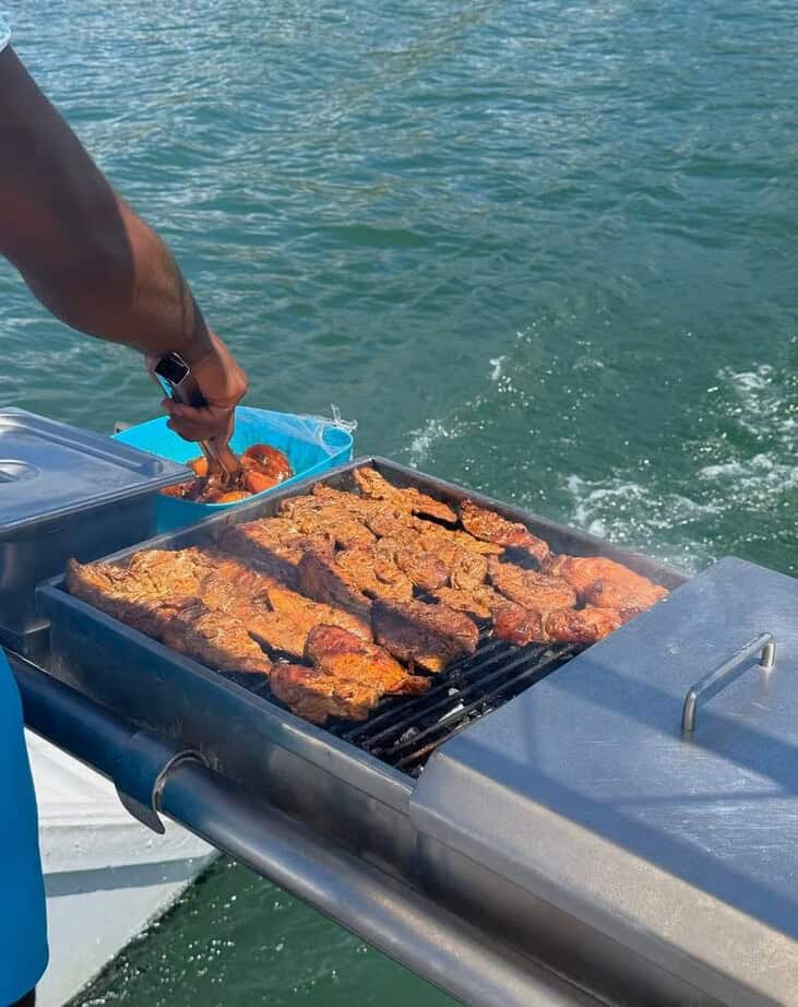 barbecue fish and chicken on a boat in Mauritius
